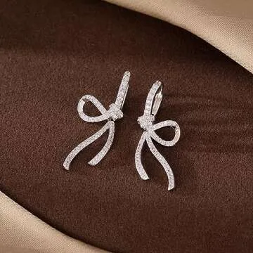 SLUYNZ Sterling Silver CZ Bow Hoop Earrings for Women Teen Girls Rhinestone Bow Ribbon Earrings Huggie Drop for Christmas (A-Silver)