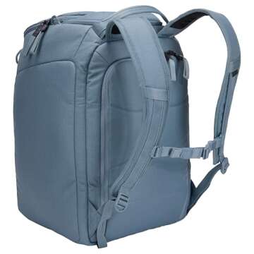 Thule RoundTrip 45L Boot Backpack - Storage compartments to organize and protect gear - Boot bag for ski and snowboard travel - Soft pocket for goggles and helmet - Built in standing pad