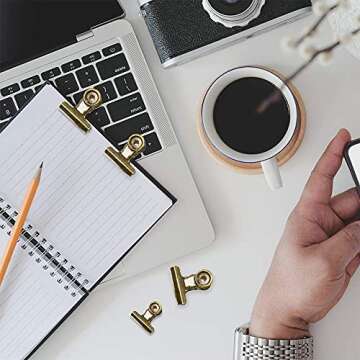 YUCHIYA 12 Pack Metal Clips with 12 Push-pins for Corkboard,Bulldog Clips for Hanging Pictures,Small Hinge Clips for Crafts,Mini Binder Clips Paper File Clamps for Office School(1.5 Inch,Bronze)