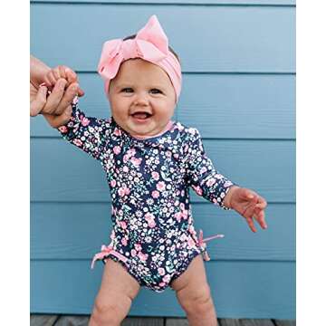 RuffleButts Baby Girls UPF 50+ Sun Protection Floral Printed Long Sleeve One Piece Rash Guard Swimsuit with Zipper - Moonlit Meadow, 6-12m