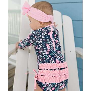 RuffleButts Baby Girls UPF 50+ Sun Protection Floral Printed Long Sleeve One Piece Rash Guard Swimsuit with Zipper - Moonlit Meadow, 6-12m