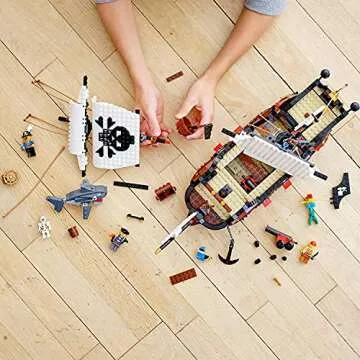 LEGO Creator 3 in 1 Pirate Ship Building Set, Kids can Rebuild The Pirate Ship into an Inn or Skull Island, Features 4 Minifigures and Shark Toy, Makes a Great Gift for Kids Ages 9+ Years Old, 31109