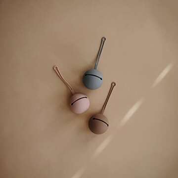 Mushie Silicone Pacifier Holder Case in Cloudy Mauve