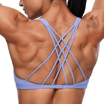 CRZ YOGA Women's Strappy Sports Bra - Criss Cross Back Medium Support Wireless Bra for Yoga and Fitn...