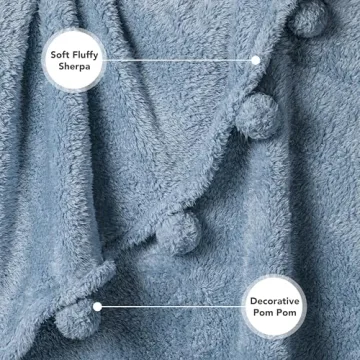 PAVILIA Blue Sherpa Throw Blanket for Couch, Warm Plush Pom Pom Blanket Throw, Dusty Blue Fuzzy Sofa Throw, Lightweight Soft Cozy Fluffy Blanket with Pom Poms, Light Blue, 50x60