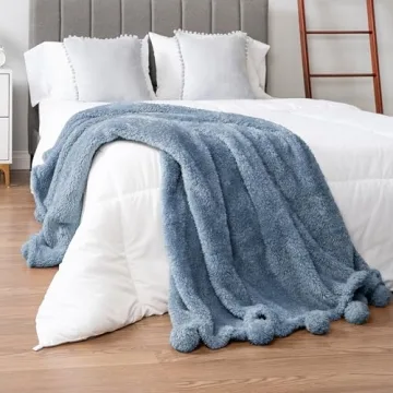PAVILIA Blue Sherpa Throw Blanket for Couch, Warm Plush Pom Pom Blanket Throw, Dusty Blue Fuzzy Sofa Throw, Lightweight Soft Cozy Fluffy Blanket with Pom Poms, Light Blue, 50x60