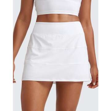 CRZ YOGA Women's High Waisted Tennis Skirts with 3 Pockets A-Line Lightweight Cute Casual Skorts Whi...