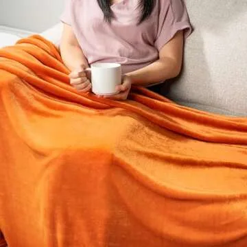 PAVILIA Orange Fleece Throw Blanket for Couch, Coral Peach Soft Fuzzy Fall Flannel Throw for Sofa, Luxury Plush Microfiber Bed Blanket, Cozy Home Halloween Velvet Gift Blanket, 50x60