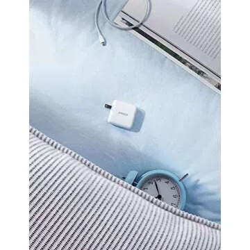 Anker Dual USB Wall Charger, PowerPort II 24W, Ultra-Compact Travel Charger with PowerIQ Technology and Foldable Plug, for iPhone XS/Max/XR/X/8/7/6/Plus, iPad Pro/Air 2/mini 4, Galaxy S9/S8/+ and More