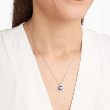 Amazon Essentials womens Sterling Silver Round Cut Created Blue Sapphire Birthstone Pendant Necklace...