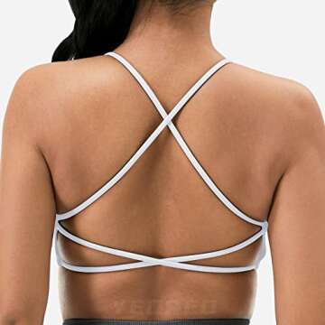 YEOREO Pearl Women's Sports Bra Strappy Criss Cross Back Bra Removable Padded Yoga Crop Top White M