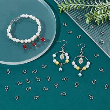 UNICRAFTALE 100pcs Column Bail Beads Stainless Steel Ring Hanger Links, Pendant Bails for Dangle Jewelry Making, 4mm Inner Diameter