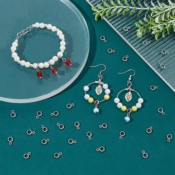 UNICRAFTALE 100pcs Column Bail Beads Stainless Steel Ring Hanger Links, Pendant Bails for Dangle Jewelry Making, 4mm Inner Diameter