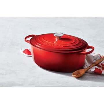 Le Creuset Enameled Cast Iron Signature Oval Dutch Oven, 5 qt. , Cerise