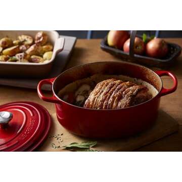 Le Creuset Enameled Cast Iron Signature Oval Dutch Oven, 5 qt. , Cerise