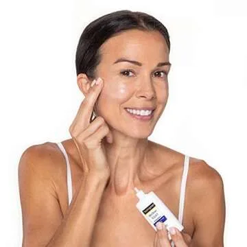 Neutrogena Ultra Sheer Liquid Daily Facial Sunscreen with Broad Spectrum SPF 70, Non-Comedogenic, Oil-Free & PABA-Free Weightless UVA/UVB Sun Protection, 1.4 fl. oz