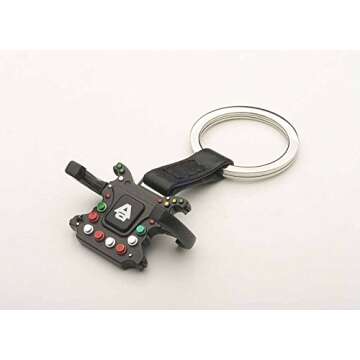 F1 Steering Wheel New Design Carabina Keychain by AUTOart - Perfect for Gearheads!