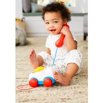 Fisher-Price Toddler Pull Toy Chatter Telephone Pretend Phone with Rotary Dial and Wheels for Walkin...