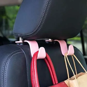 Amooca Universal Car Headrest Hooks, Car Organizer Hanger Storage Hooks for Bag Purse Cloth Grocery (Pink Set of 4)