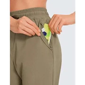 CRZ YOGA Womens Joggers Waterproof Outdoor Golf Athletic Lightweight Hiking Pants with Zipper Pockets 27" Mountain Olive Medium