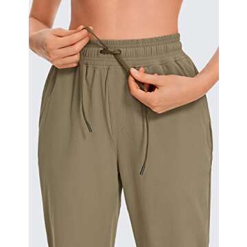 CRZ YOGA Womens Joggers Waterproof Outdoor Golf Athletic Lightweight Hiking Pants with Zipper Pockets 27" Mountain Olive Medium