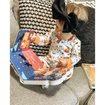 Babies Love Halloween: A Lift-a-Flap Board Book for Babies and Toddlers