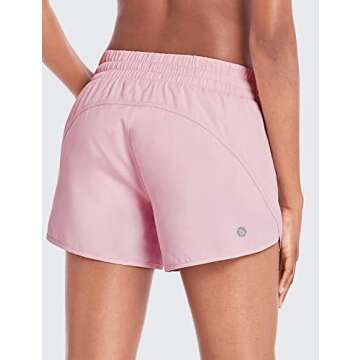 BALEAF Women's 4" Running Athletic Shorts with Liner Zipper Pockets for Workout Gym Sports Pink Medium