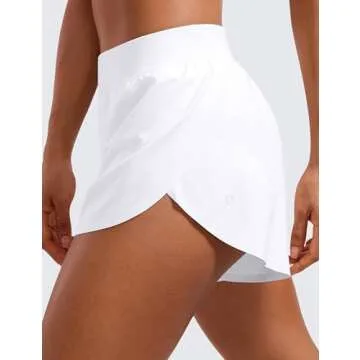 CRZ YOGA Mid Waisted Dolphin Athletic Shorts for Women 4" Lightweight High Split for Gym Workout with Liner Quick Dry White Medium