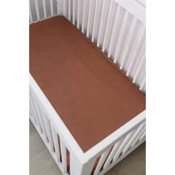 Mebie Baby Stretch Sheet in Rust – Perfect Nursery Décor