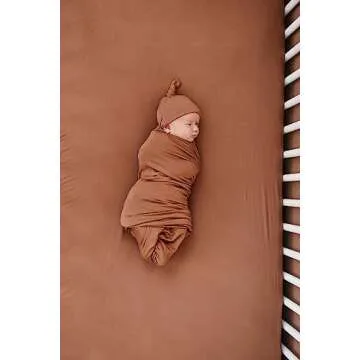 Mebie Baby Stretch Sheet in Rust – Perfect Nursery Décor