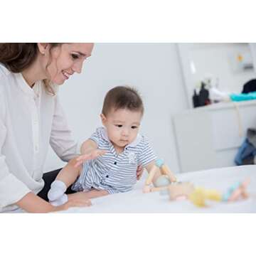 PlanToys Wooden Clutching Triangle Baby Toy with Gentle Sound in Two-Toned Ball (5256) | Pastel Color Collection |Sustainably Made from Rubberwood and Non-Toxic Paints and Dyes