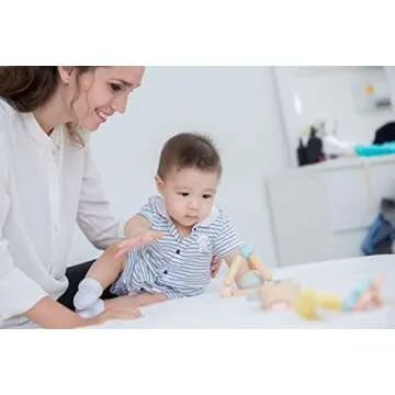 PlanToys Wooden Clutching Triangle Baby Toy with Gentle Sound in Two-Toned Ball (5256) | Pastel Color Collection |Sustainably Made from Rubberwood and Non-Toxic Paints and Dyes