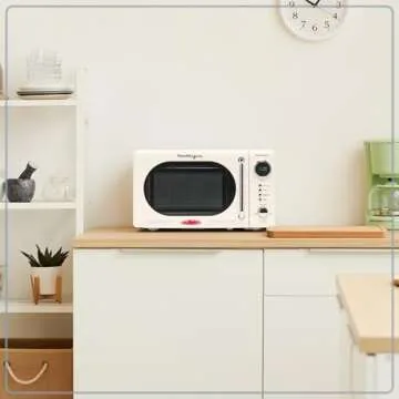 Nostalgia NRMO7IVY6A Retro Compact Countertop Microwave Oven, 0.7 Cu. Ft, Ivory