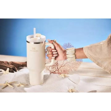 Stanley Quencher H2.0 FlowState Stainless Steel Vacuum Insulated Tumbler with Lid and Straw for Water, Iced Tea or Coffee, Smoothie and More, Cream , 40 oz