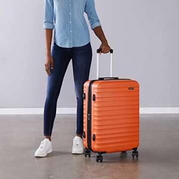 Amazon Basics 26-Inch Hardside Checked Luggage, Hardshell Suitcase With Wheels, Expandable For Up to 15% More Space, With Scratch-Resistant Surface, Four Multi-directional Wheels, Orange