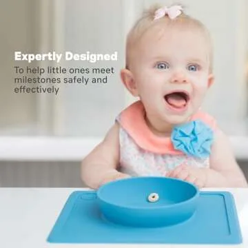ezpz Mini Bowl for 12 Months+ (Blue) - 100% Silicone Suction Bowl with Built-in Placemat for Toddlers - Comes with a Reusable Travel Bag