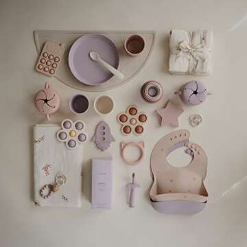 mushie Silicone Baby Bib | Adjustable Fit Waterproof Bibs (Daisy)