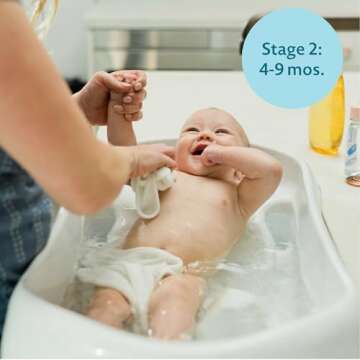 The First Years Rain Shower Baby Bathtub — Baby Spa for Newborn to Toddler — Includes Convertible Bathtub and Sling with Soothing Spray — Baby Bath Essentials