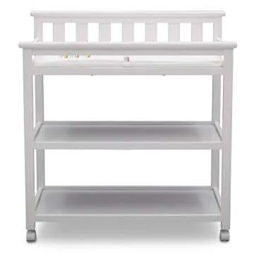 Delta Children Flat Top Changing Table with Wheels and Changing Pad - Greenguard Gold Certified, Bianca White