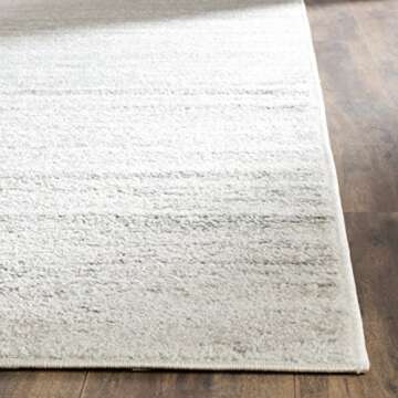 SAFAVIEH Adirondack Collection Area Rug - 6' x 9', Ivory & Silver, Modern Ombre Design, Non-Shedding & Easy Care, Ideal for High Traffic Areas in Living Room, Bedroom (ADR113B)