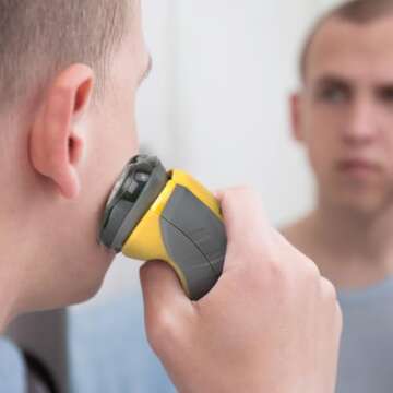 Remington Virtually Indestructible Rotary Shaver 5100, Electric Razor for Men, 100% Waterproof Design, Yellow