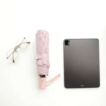 BAODINI Small UV Protection Travel Umbrella Compact for Rain and Sun UPF 50+ Windproof Portable 42 inch Umbrella for Women and Men