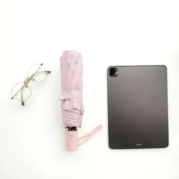 BAODINI Small UV Protection Travel Umbrella Compact for Rain and Sun UPF 50+ Windproof Portable 42 inch Umbrella for Women and Men