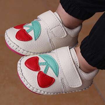 Lidiano Baby Non Slip Rubber Sole Cartoon First Walking Slippers Crib Shoes Newborn Infant Toddler Training Shoes (6-12 Months Infant, White Cherry)