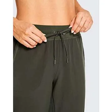 CRZ YOGA Women's Lightweight Workout Joggers 27.5" - Travel Casual Outdoor Running Athletic Track Hiking Pants with Pockets Dark Olive X-Small
