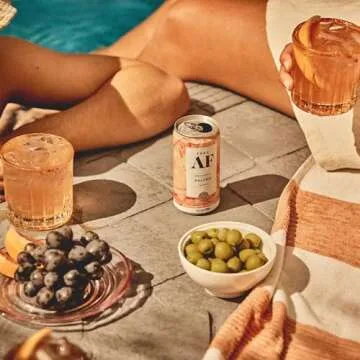 Non-Alcoholic Paloma, Ready to Drink Mocktail with Afterglow, Low Calories, Refreshing Lime & Pink Grapefruit, 8.4 fl oz Cans (12 pack)