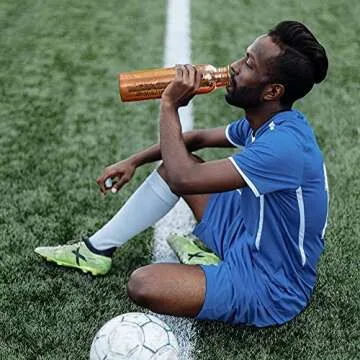 Cop29 Dual Hammered + Hand Engraved Premium Design Pure Copper Mira Glossy Water Bottle with Handle : An Ayurvedic Copper Vessel - 900ml/30oz