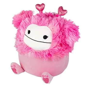 Squishmallows Original 10-Inch Caparinne The Pink Bigfoot - Official Jazwares Valentine's Day Plush - Collectible Soft & Squishy Stuffed Animal Toy - Add to Your Squad - Gift for Kids, Girls & Boys