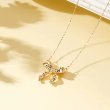 Elegant VULETO Gold Bow Necklace Perfect for Women