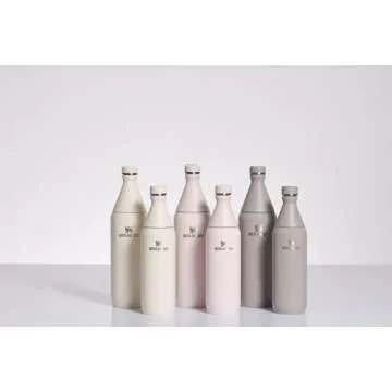 Stanley All Day Slim Bottle 34 OZ | Twist off Lid with Leakproof Seal | Slim Design for Travel & Gym | Insulated Stainless Steel | BPA-Free | Cream